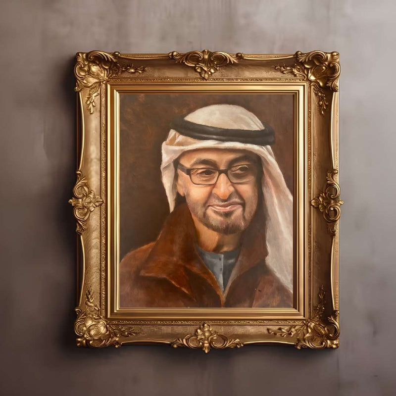Portrait of a man with glasses and a white headscarf in a gold frame on a textured wall.